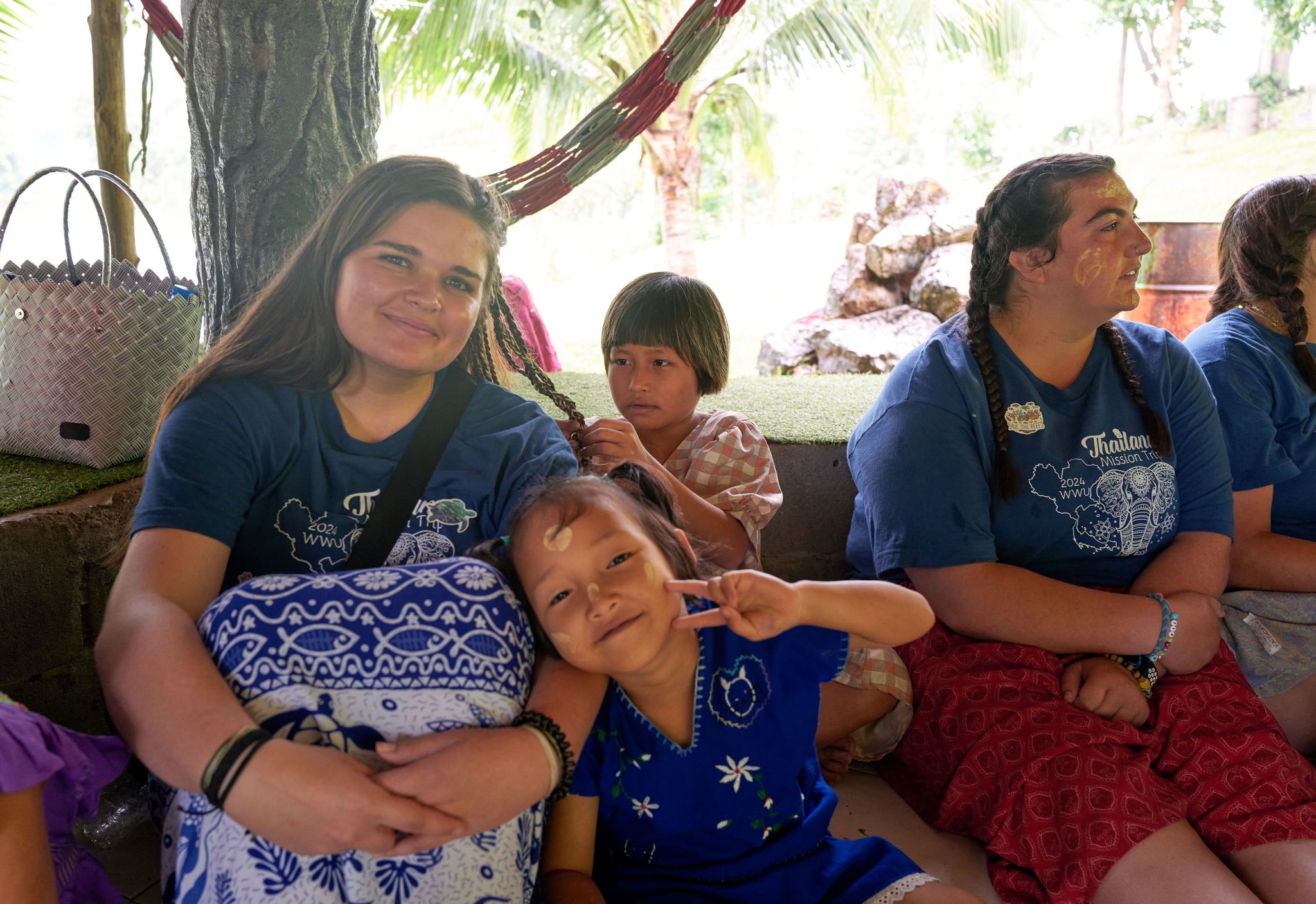 Some WWU student volunteers with children from the Bamboo School