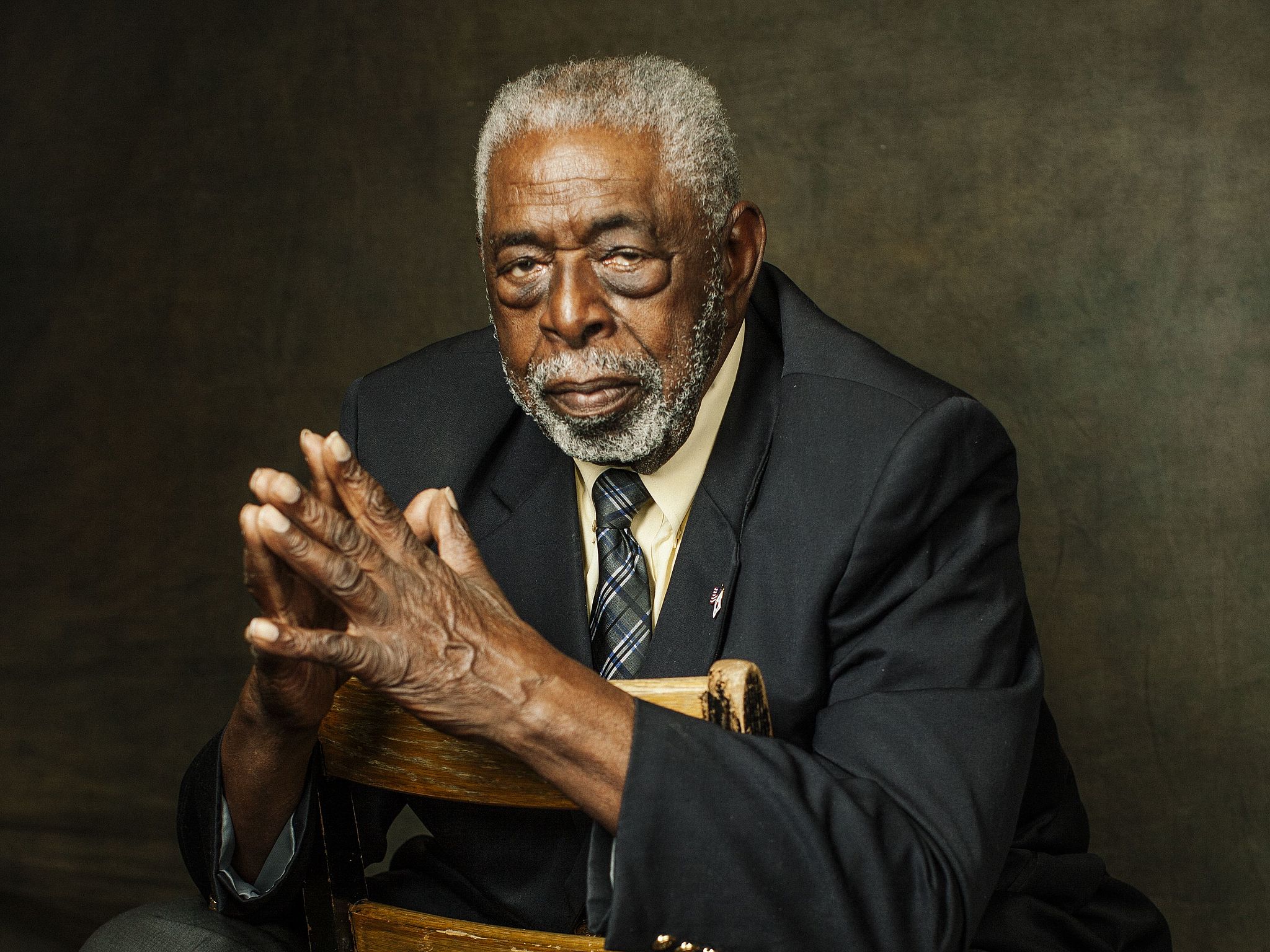 Portrait of Donald Blake wearing a dark suit.