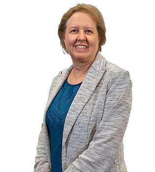 Headshot photo of Carol Healy against a white background