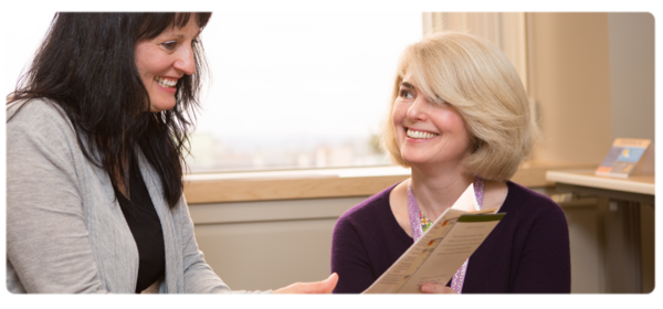 A social worker assists a client
