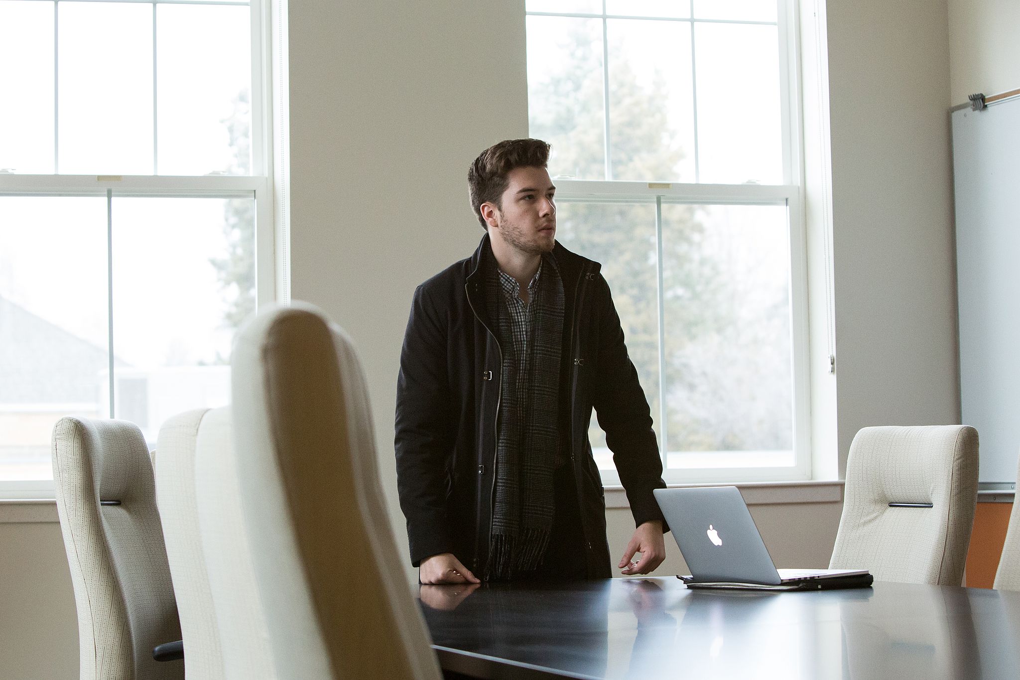 Man standing alone in bowers classroom