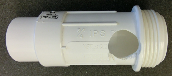 PVC slider with access hole machined into side.