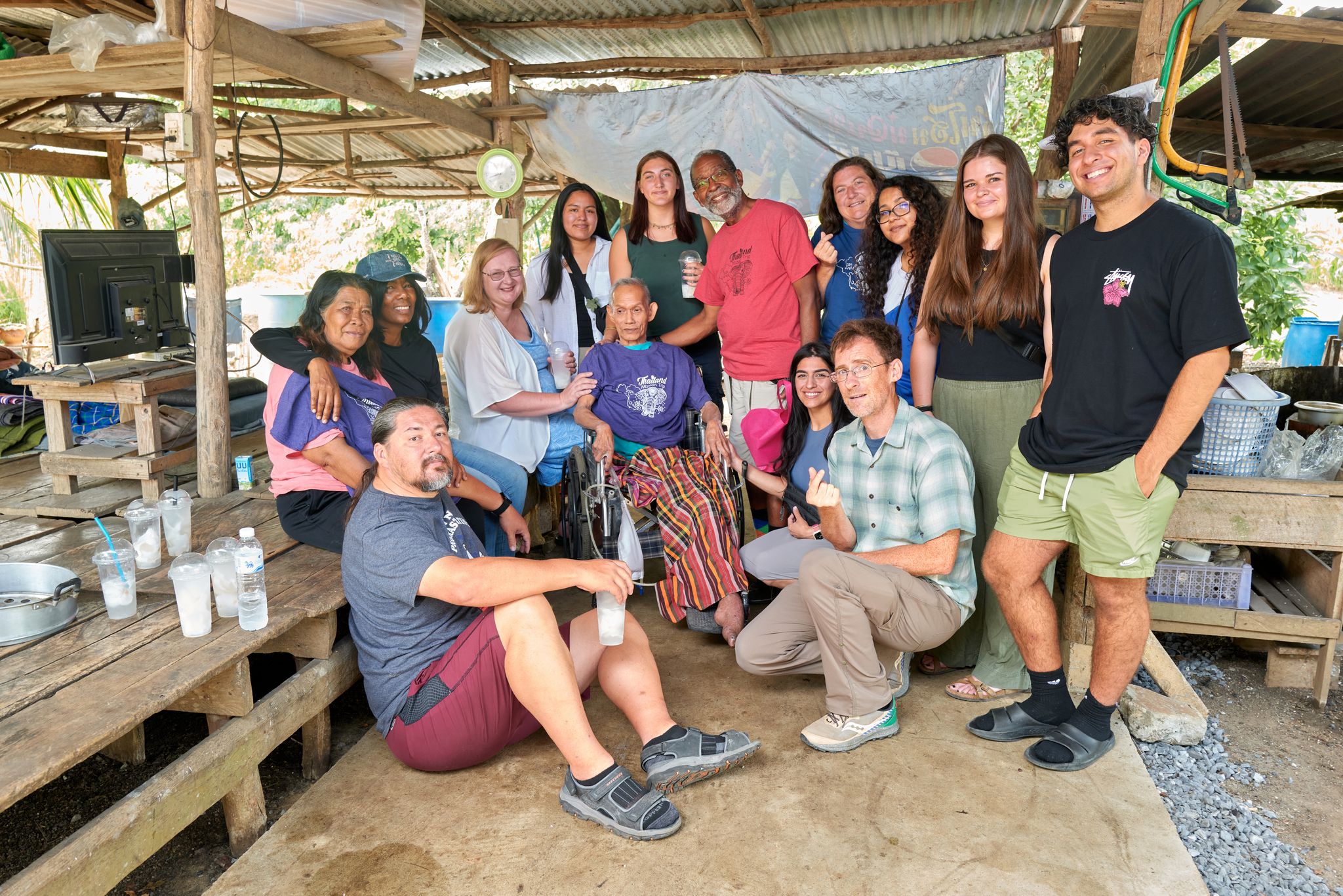 Group photo of WWU volunteers and the local Thai farming family