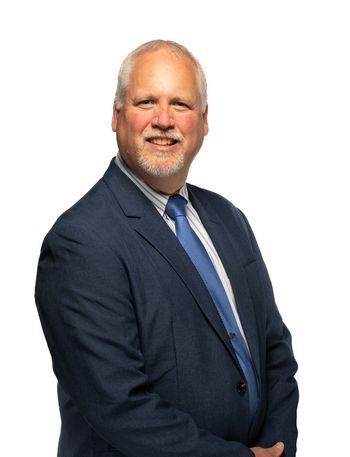 Headshot of David Ringe with a white background
