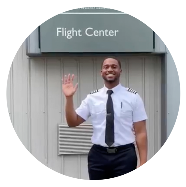 Leaundre waving at the camera