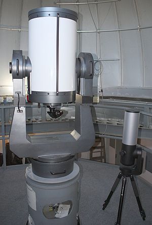 Two telescopes compared in size.