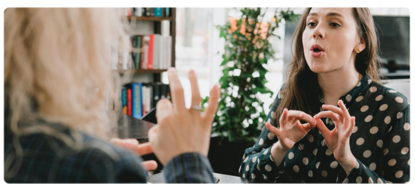 A language pathologist works with a client