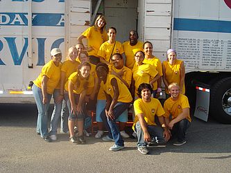 group photo of students in yellow t-shirts