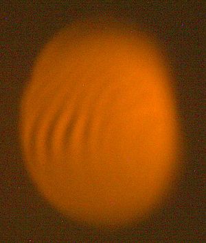 Interference pattern showing light and dark bands from the doublet.