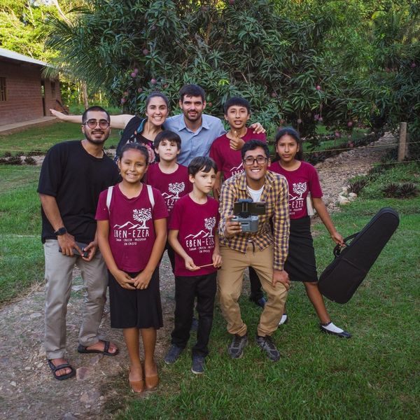 Group of smiling young people at Eben-Ezer