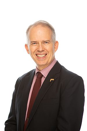 Photo of Carl Cosaert against a white background